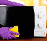 Wipe down exterior of microwave, oven and fridge